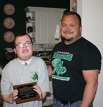 Cody Jones Receives 12th Man Award at Pickens Alumni Football Game