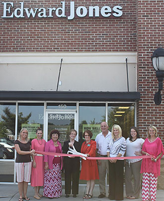 TAWANNA WESSON WITH EDWARD JONES CUTS RIBBON